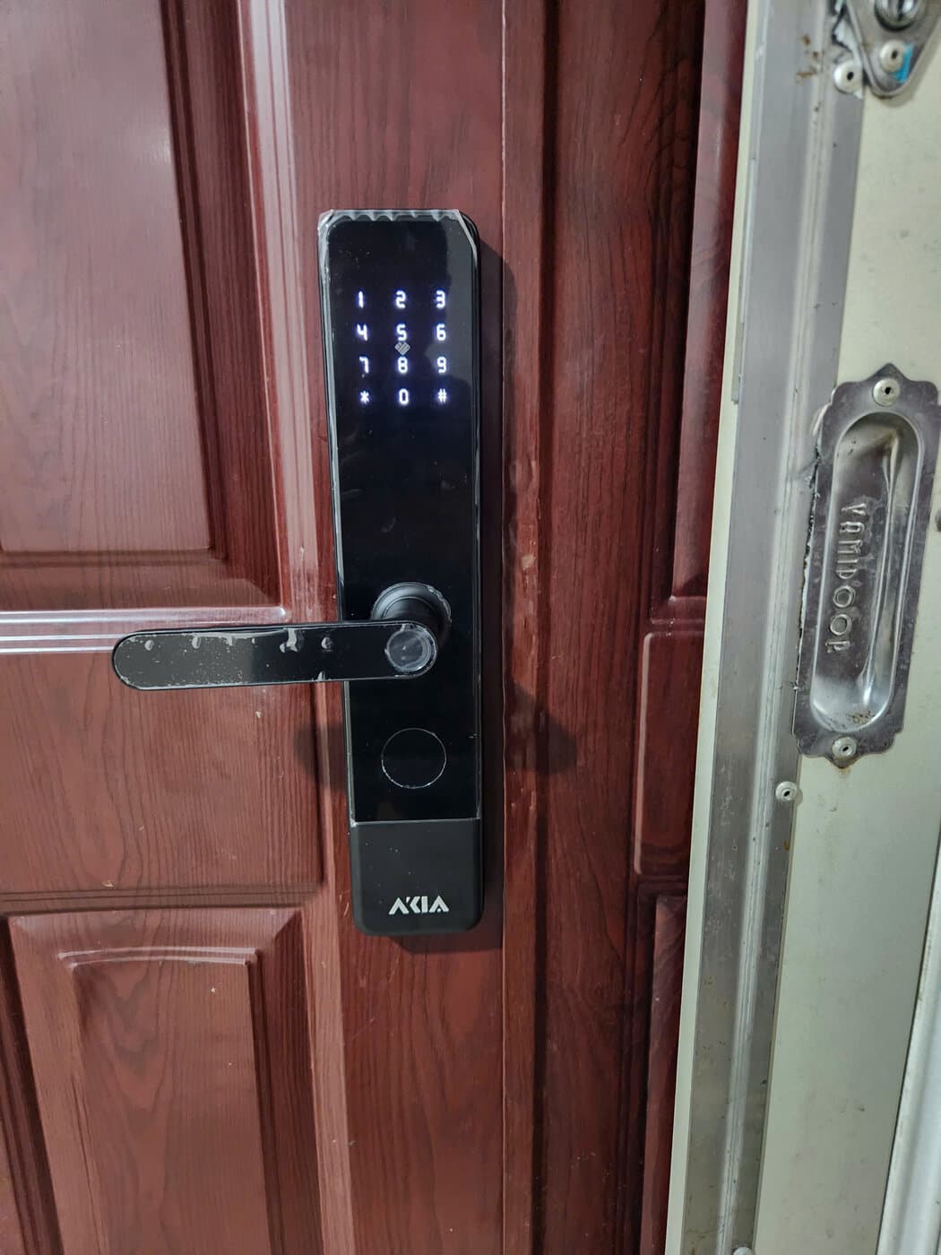 Khoá điện tử lắp cửa gỗ — công trình thực tế doorlock.vn