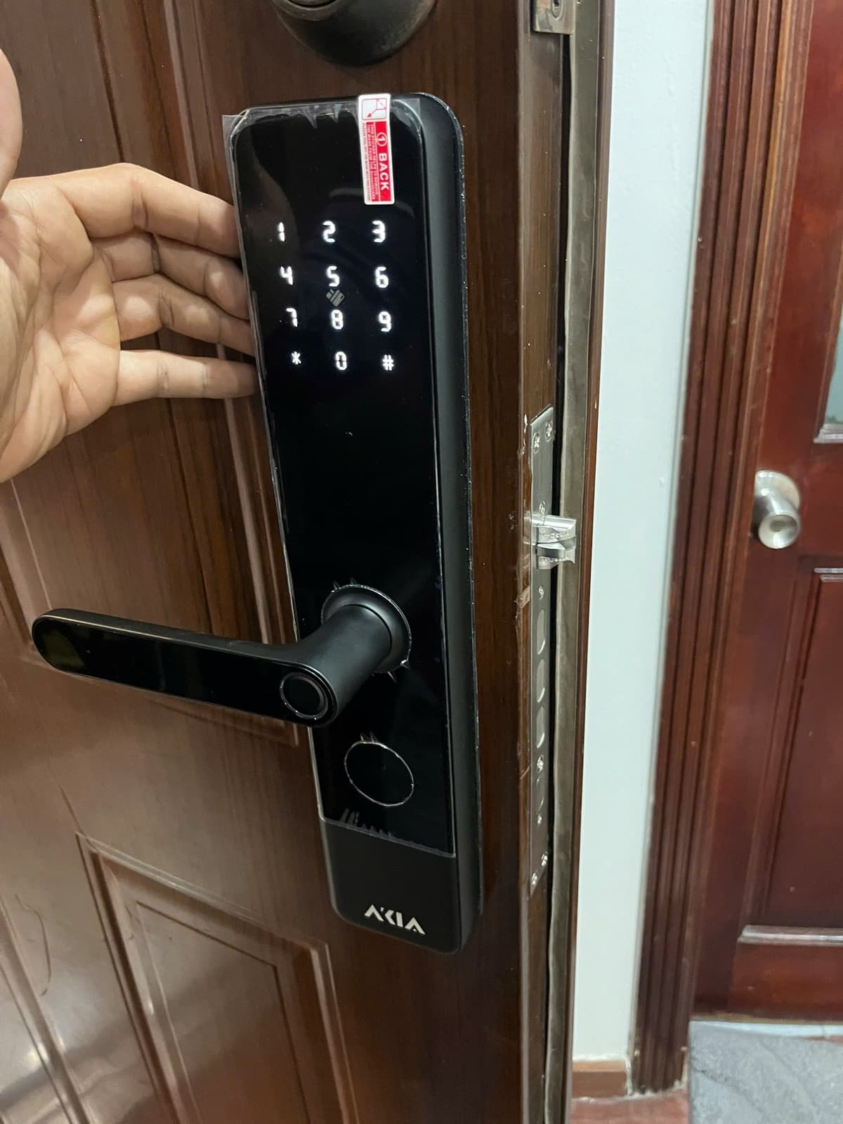 Khoá điện tử lắp cửa gỗ — công trình thực tế doorlock.vn (13/06/2026)